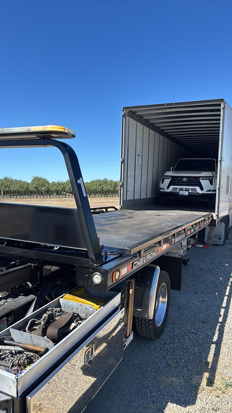 Luxury SUV towing Lathrop CA - Lexus enclosed transport loading