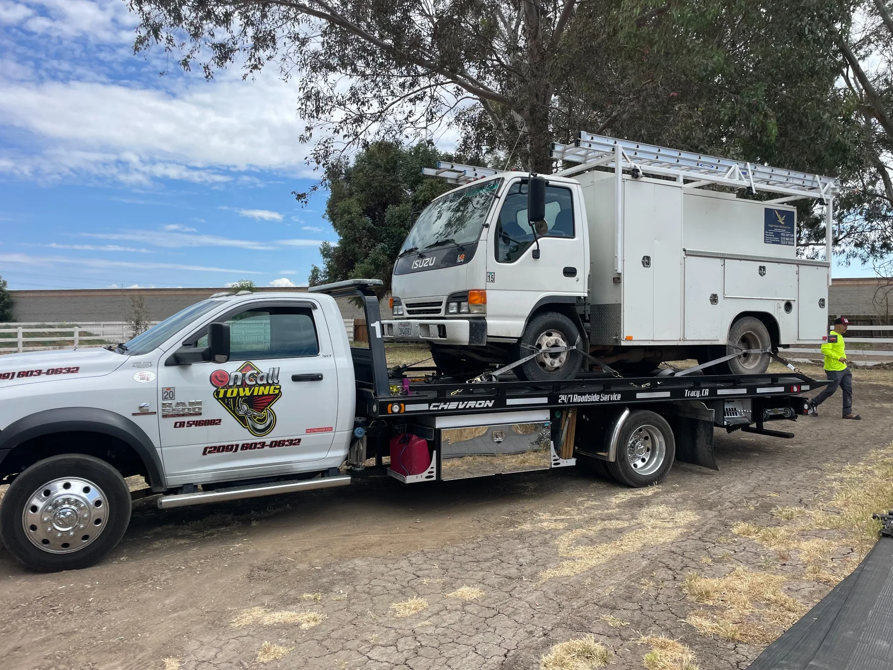 Utility service truck towing